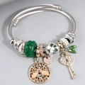 Adjustable charm bracelet featuring bee and heart key pendants with green crystal beads - Green
