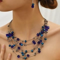 Bohemian gelaagde ketting en oorbellen set met blauwe kristallen en metalen kralen - Saffierblauw