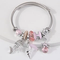 Bracciale argento con ciondoli a forma di lisca di pesce, stella marina e conchiglia rosa - Rosa