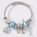 Bracciale in acciaio inossidabile con ciondoli a stella marina e perline blu per donna - Blu