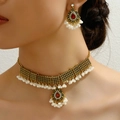 Set collana e orecchini retrò dorati con strass rossi e perle bianche eleganti - Set Rosso (30924301)