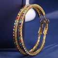 Orecchini a cerchio dorati da 5cm con strass arcobaleno su una scatola di gioielli - 5.0cm / Base dorata colorata