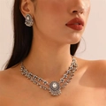 Vintage bohemian jewelry set with silver floral engraving, tassel bells and clear crystal - Necklace and Earring Set / Silver White