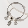 Bracciale a cavo d'argento con perle, ciondoli Albero della Vita e Mano di Fatima - Mano di Hamsa