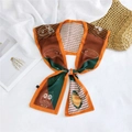 Detail of a knotted double-layer silk scarf with cartoon animal prints and houndstooth - Orange Houndstooth Owl (7)