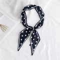 Elegant black and white polka dot silk twilly scarf tied in a bow on linen - Black Background White Polka Dot (4 Curved Polka Dot Black)