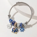 Silver tree of life and blue elephant charm bracelet with stainless steel twisted cable - Sapphire Blue