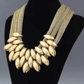 Bohemian multi-layer gold chain necklace with woven mesh and olive-shaped fringe drops - Gold