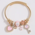Vergoldetes Edelstahl-Charm-Armband mit rosa Kristallen und Herz-Schlüssel-Anhängern - Rosa