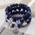 Bohemian multi-layer beaded bracelet set with silver elephant, anchor and butterfly charms - Dark Blue