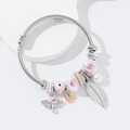 Bracciale regolabile in filo d'acciaio con ciondoli a elefante e malocchio in rosa e argento - Rosa