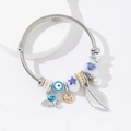 Bracciale regolabile in acciaio inossidabile con ciondoli a elefante, occhio e piuma - Blu