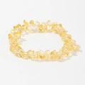Close-up of handmade elastic bracelet with irregular natural yellow citrine stone chips - Yellow (Citrine)