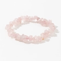 Detailed shot of handmade elastic bracelet with irregular natural pink quartz stones - Light Pink (Rose Quartz)