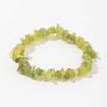 Macro shot of irregular natural green prehnite stone beads on a handmade stretch bracelet - Yellow-Green (Prehnite/Peridot)