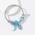 Silver owl moon beaded wire bracelet with blue crystal charms for a minimalist look - Blue