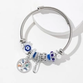 Bracciale a cavo in acciaio argento con ciondoli Albero della Vita e Malocchio - Blu
