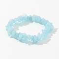 Close-up of light blue raw crystal chips elastic bracelet on a clean white background - Light Blue