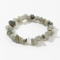 Detailed close-up of natural labradorite gemstone chips on an elastic beaded bracelet - Gray