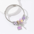 Bracciale con ciondoli argento, fiori in smalto viola, chiavi a cuore e corone reali - Viola