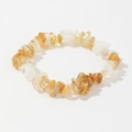 Detailed close-up of polished natural citrine and clear quartz stone beads on bracelet - Citrine Clear (6)
