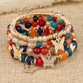 Böhmisches mehrlagiges Perlenarmband-Set mit bunten Kristallperlen und goldenen Schmetterlingen - Bunt