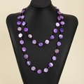 Bohemian purple shell disc long necklace with beaded crystal accents on black mannequin - Purple