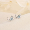 Elegant moonstone elk stud earrings in silver with blue gemstone on beige fabric - Silver Sky Blue Gemstone Style (C46)