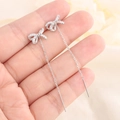 Elegantes pendientes de lazo plateados con borlas de cadena larga y estilo minimalista - Plata (A58)