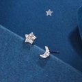 Asymmetric S925 silver star and moon stud earrings with shimmering cubic zirconia stones - Silver
