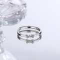 S925 sterling silver bow ring with zircon stones on white reflective background - Zirconia Inlay Bow Ring (B13)