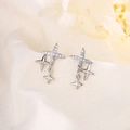 Orecchini a stella a quattro punte con zirconi e nappe stellate in tonalità argento - Argento (C125)