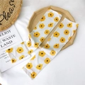 Summer ice silk sun protection arm sleeves featuring a fresh white and yellow floral print - Calendula