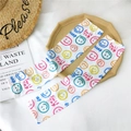 White ice silk cooling sun sleeves featuring colorful smiling face prints and text - Colorful Smile