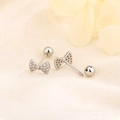Elegant silver bow stud earrings with sparkling zircons and secure screw back closure - White Gold