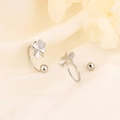 Silver four-leaf clover screw-back earrings with zircon inlay on linen background - White Gold (A151)