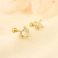 Detail view of gold cupid arrow and heart zircon screw back earrings on beige fabric - Gold (C169)