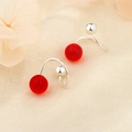 Macro shot of S925 sterling silver U-shaped screw earrings with a red translucent bead - A162 Spiral Style / Red (Silver Style)