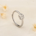 Elegant S925 sterling silver ring featuring a hollow rose design on a textured fabric - Hollow Rose Flower Style (B40)