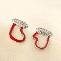 Macro shot of festive red enamel Christmas stocking earrings with sparkling crystals - Red Christmas Stocking Style (C187)