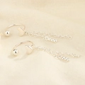 Minimalist silver heart ear cuffs with double chain tassels on beige fabric background - Price per Pair / Silver