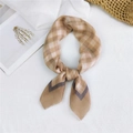 Brown checkered cotton-linen square scarf with contrast color trim tied on white surface - Classic Gingham Khaki