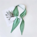Pleated double-layer green silk scarf with white polka dots in a tied decorative style - Pleated Polka Dot Green