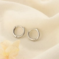 Macro shot of minimalist S925 sterling silver hoop earrings with clear S925 hallmark - Single Piece / 8mm / Silver