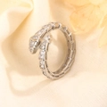 Elegant silver snake ring with pavé diamonds featuring a scale design on beige fabric - Platinum Snake Style (B49-Platinum) / Silver (B49-Platinum)