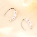 Elegant silver hook earrings featuring three cascading round white pearls for women - Triple Pearl Style (A194)