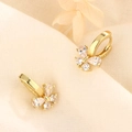 Eleganti orecchini a fiocco dorati con zirconi brillanti e marchio argento S925 - Oro