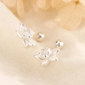Elegant silver lotus flower stud earrings with screw back design on soft beige fabric - Silver Lotus Style (C239)