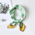 Light green daisy print silk scarf tied in a bow with yellow accents and black border - 8 Multi-Daisy Yellow Edge
