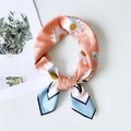 Pink orange silk neck scarf featuring white daisy floral prints and light blue trim - 11 Starry Daisy Orange